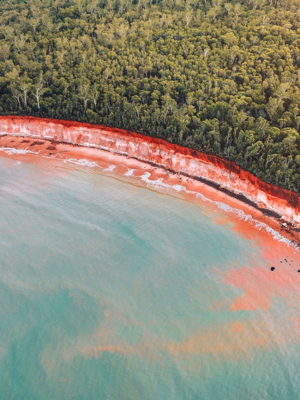 an aerial view of a beach on the Tiwi Islands