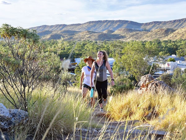 a group of hikers traversing the trail to ANZAC Hill