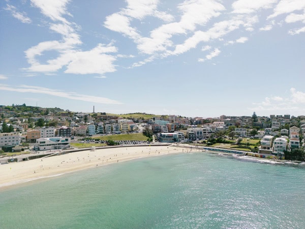 an aerial view of the tranquil white sand beach at Bondi Beach
