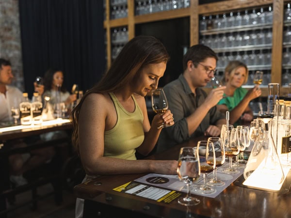 visitors sampling spirits at Bundaberg Rum Distillery