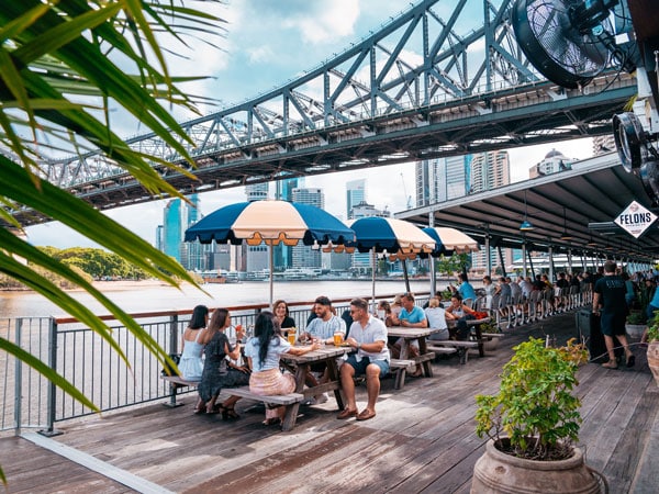 people dining al fresco at Felons Brewing Co, Howard Smith Wharves