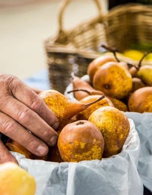 fresh pears available for purchase at the Orange Farmers Market.