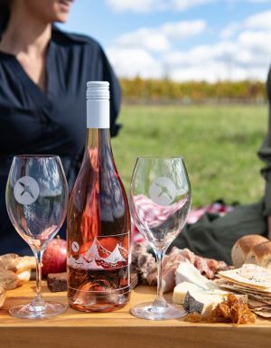 Two women enjoying a platter while on Printhie Helicopter Ultimate Winery Tour