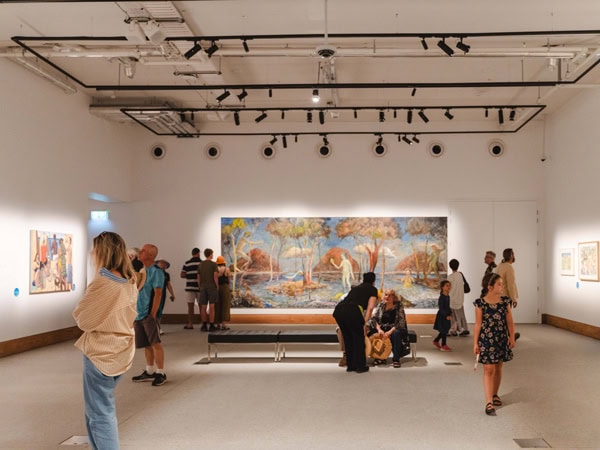 visitors looking at the art displays inside Yarrila Arts And Museum