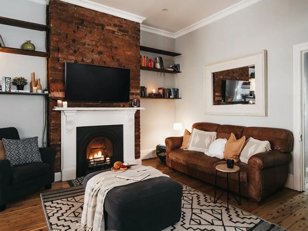 the living room with fireplace at La Mia Casa, Orange