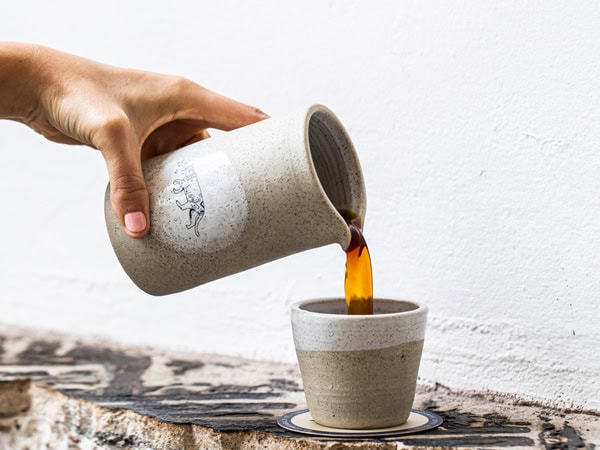 pouring coffee into a cup at Paramount CoffeeProject, Sydney