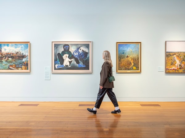 a woman strolling inside the Bendigo Art Gallery