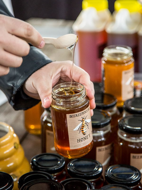 Local honey from The Beekeeper's Inn available for purchaseat the Orange Farmers Market.