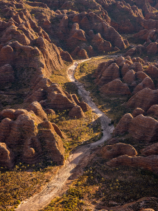 an aerial view of the karst sandstone domes in the Bungle Bungle Range, Purnululu National Park