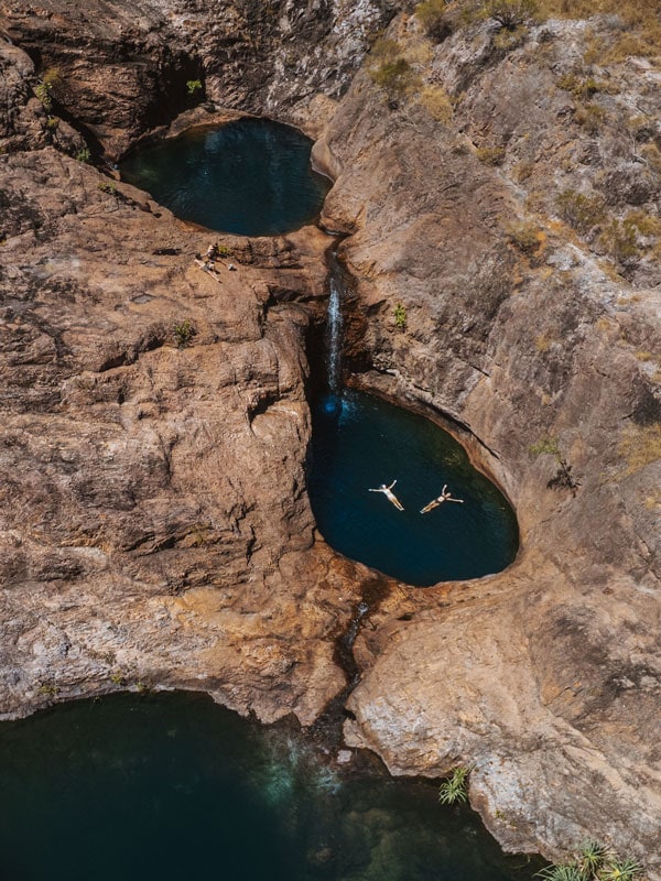 swimming in a waterhole at Surprise Creek Falls