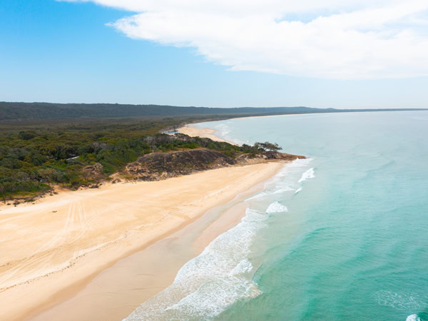 an aerial view of the beach at Adder Rock