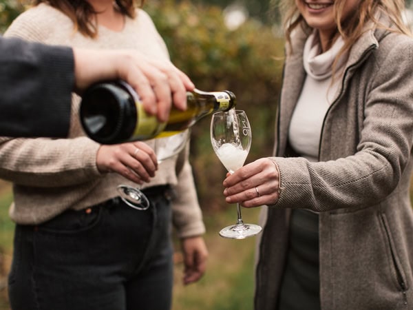 two females wine tasting at Dal Zotto wines on Prosecco Road