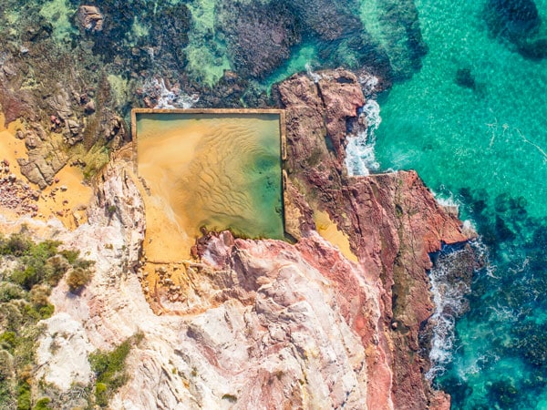 an aerial view of Aslings Beach Rock Pool in Eden