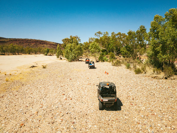 an ATV navigating the dirt road towards Finke Gorge National Park
