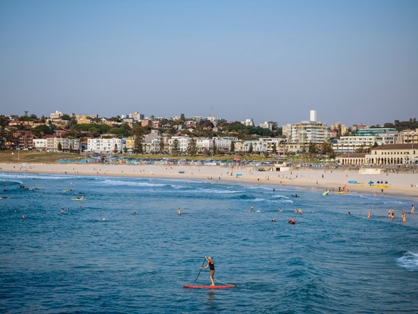 an aerial view of beachgoers enjoying at Bondi Beach