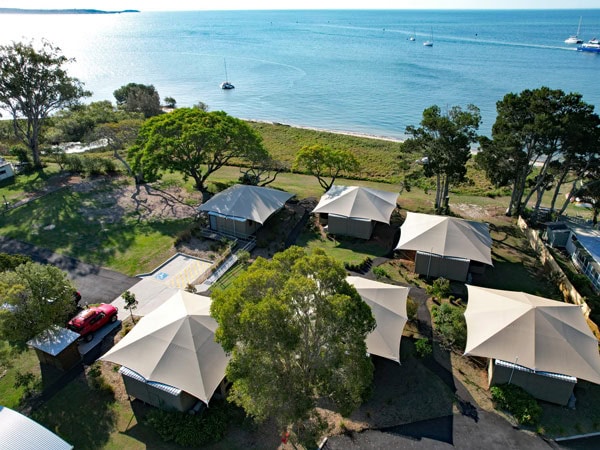 an aerial view of the camping site on Bradbury’s Beach at Minjerribah Camping