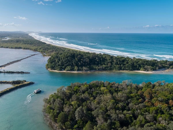 Aerial view of Byron Bay Eco river cruise on the beautiful Brunswick River, part of Cape Byron Marine Park.