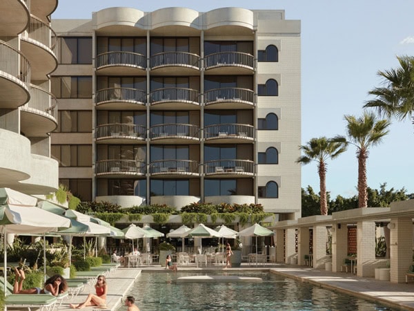 an outdoor pool at The Calile Hotel