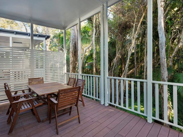 a deluxe cabin terrace at Discovery Parks — Emerald Beach
