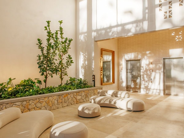 neutral tones, timber and stone interior at Kirra Point