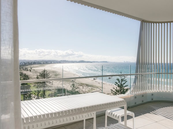 a balcony overlooking Kirra Beach