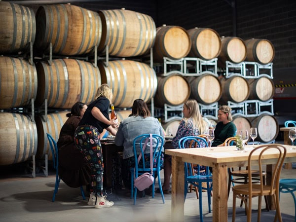 Group of friends having a wine tasting at Fleet Wines in Gippsland