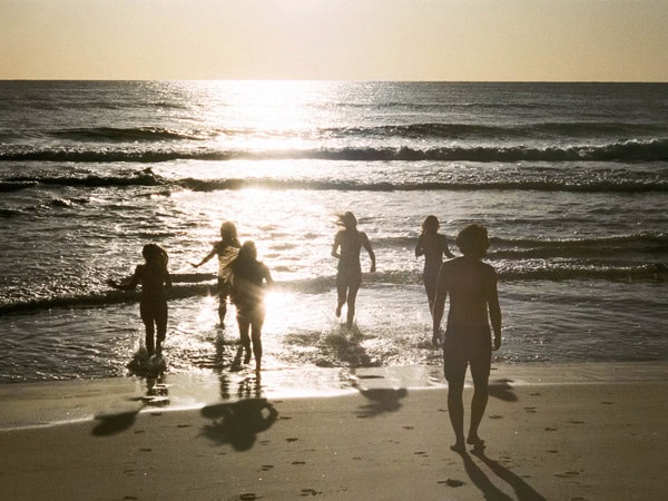 Members of Generation SPF in Noosa go for a sunrise swim