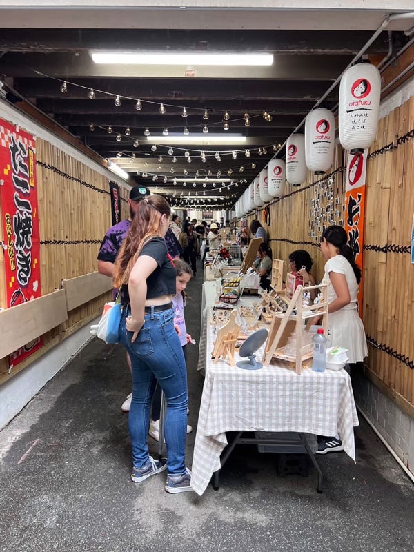 people browsing through the items for sale at Genki Market, Brisbane