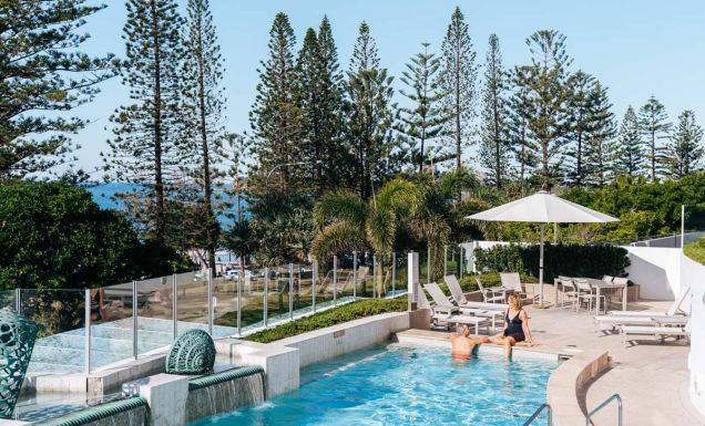 Couple enjoy pool at Oceans Mooloolaba Beach