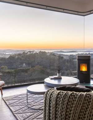 the accommodation interior with fireplace of Sierra Escape, Mudgee, NSW