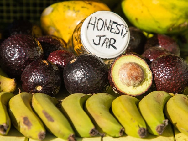 Fresh produce and honesty jar at Norfolk Island markets