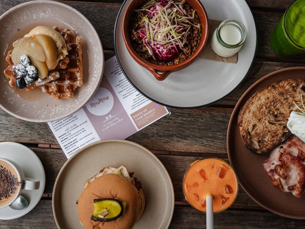 a spread of food and drinks on the table at MorMors, Merimbula