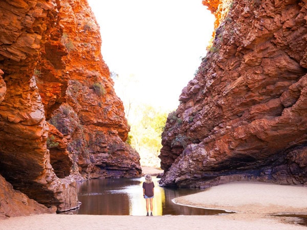 a woman standing at Simpsons Gap
