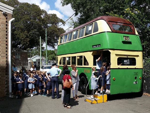 people entering a vintage double decker, Sydney Bus Museum, NSW