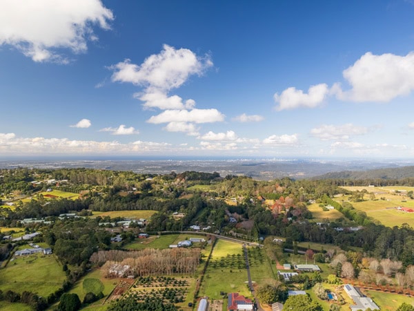 an aerial view of the scenic hinterland landscape in Tamborine Mountain, QLD