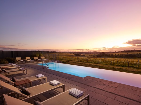 the infinity pool with sun loungers at The Louise, SA
