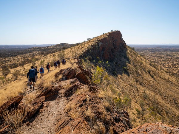 hikers approaching the summit at Larapinta Trail