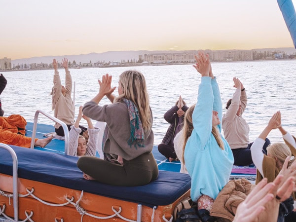 People meditating on the Wellness at Sea cruise off Glenelg