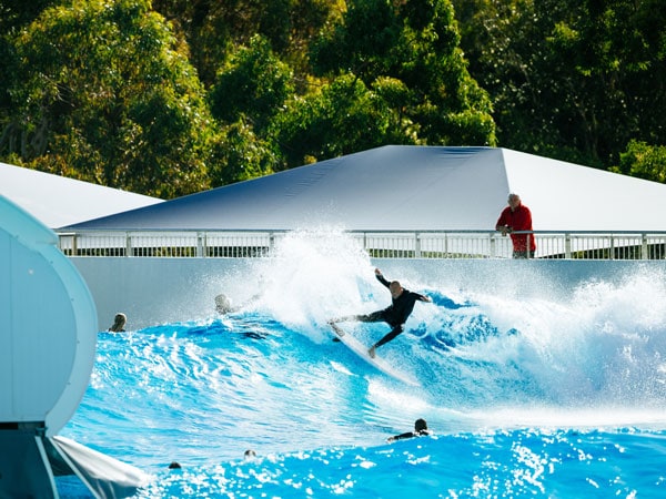 surfing at URBNSURF Sydney