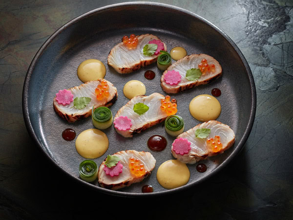 Close up of contemporary cuisine dish at Silky Oaks Lodge Treehouse Restaurant