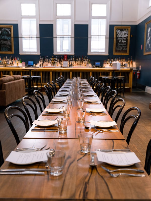 a long table dinner setup at Christmas in July Dinner and Show, WA