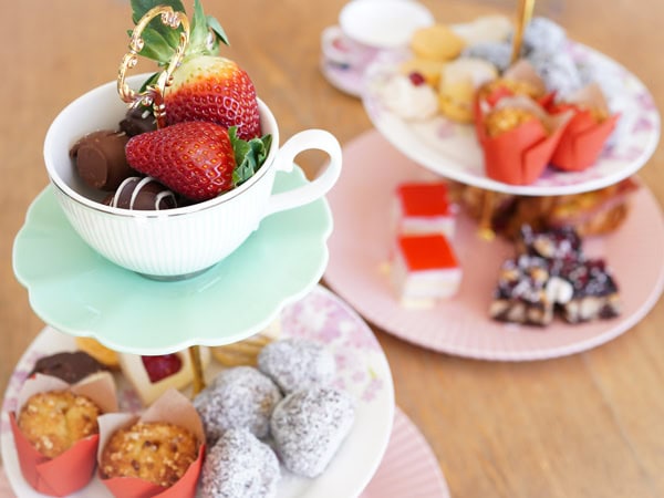 a stack of Christmas desserts at Festive High Tea, Aviary Rooftop Bar