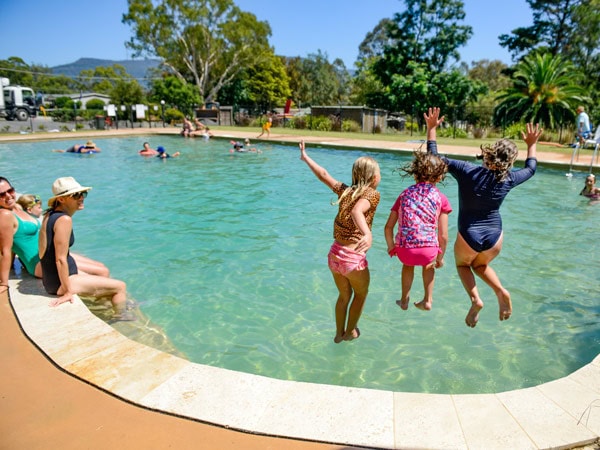 people jumping into the pool at Glenmack Park, Kangaroo Valley