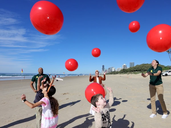 Fnas play Keepy Uppy on the Gold Coast at Kurrawa Beach