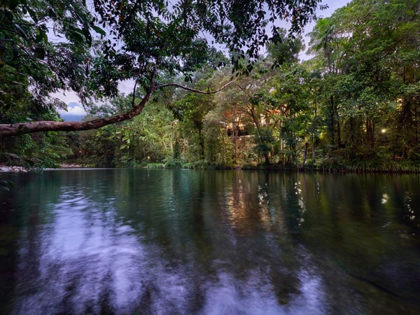 View of Silky Oaks Lodge from the river