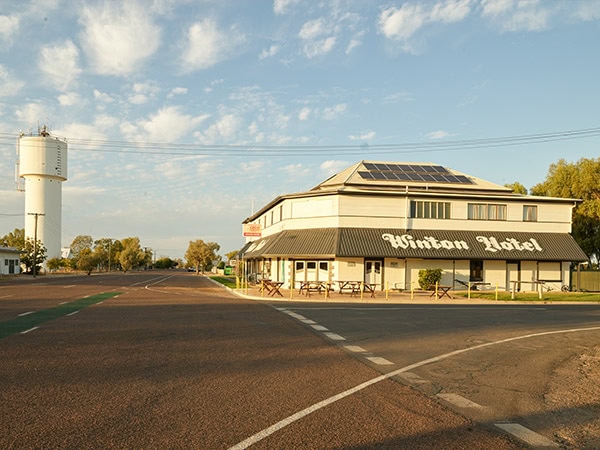 exterior shot of winton hotel and the main street of winton