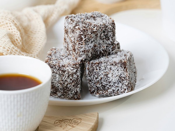 lamingtons on a plate with tea