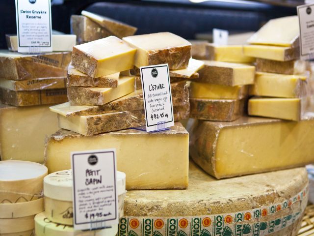 artisan cheeses on display at Adelaide Central Market