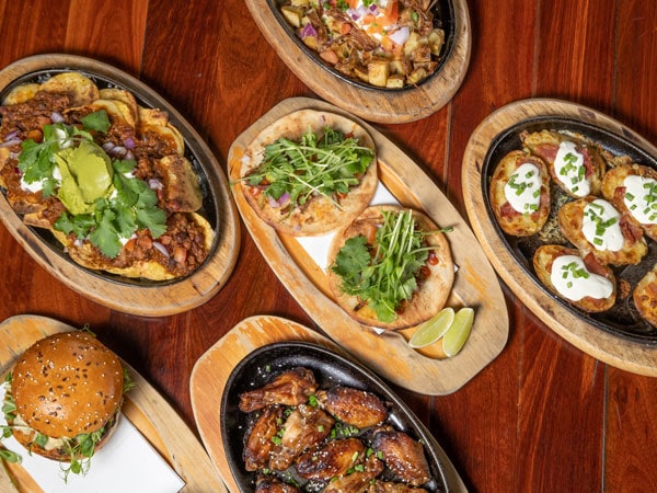 shared plates of food on the table at Beerpourium, Fremantle