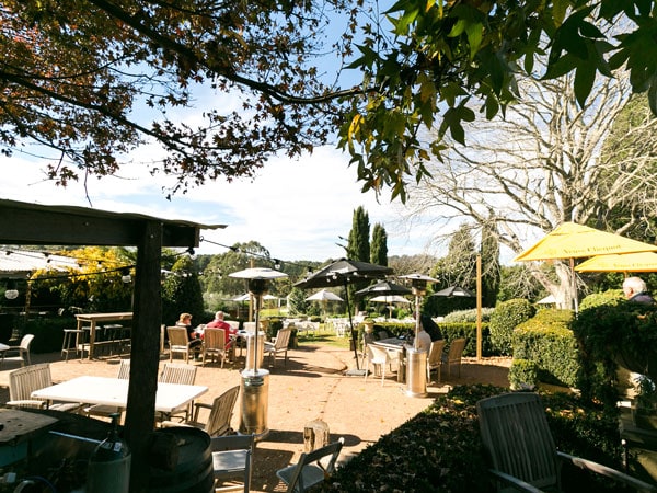 a verdant al fresco spot at Burrawang Village Hotel